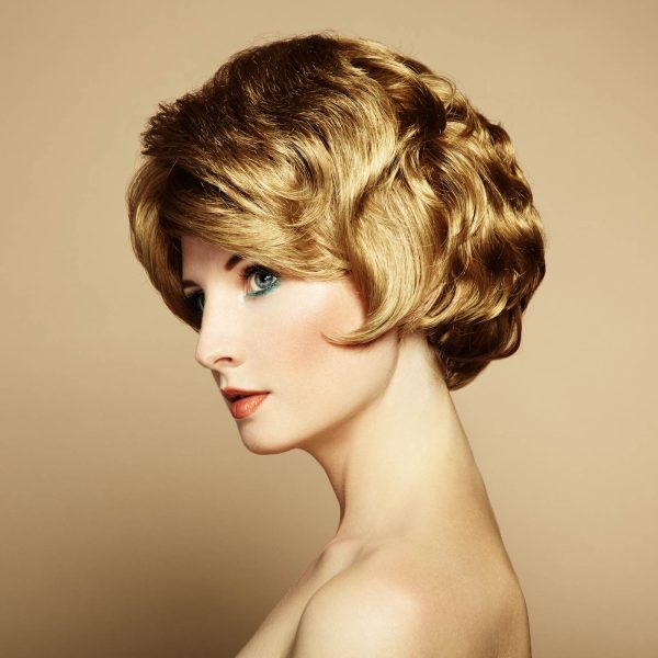 Portrait of beautiful sensual woman with elegant hairstyle. Retro hairdo